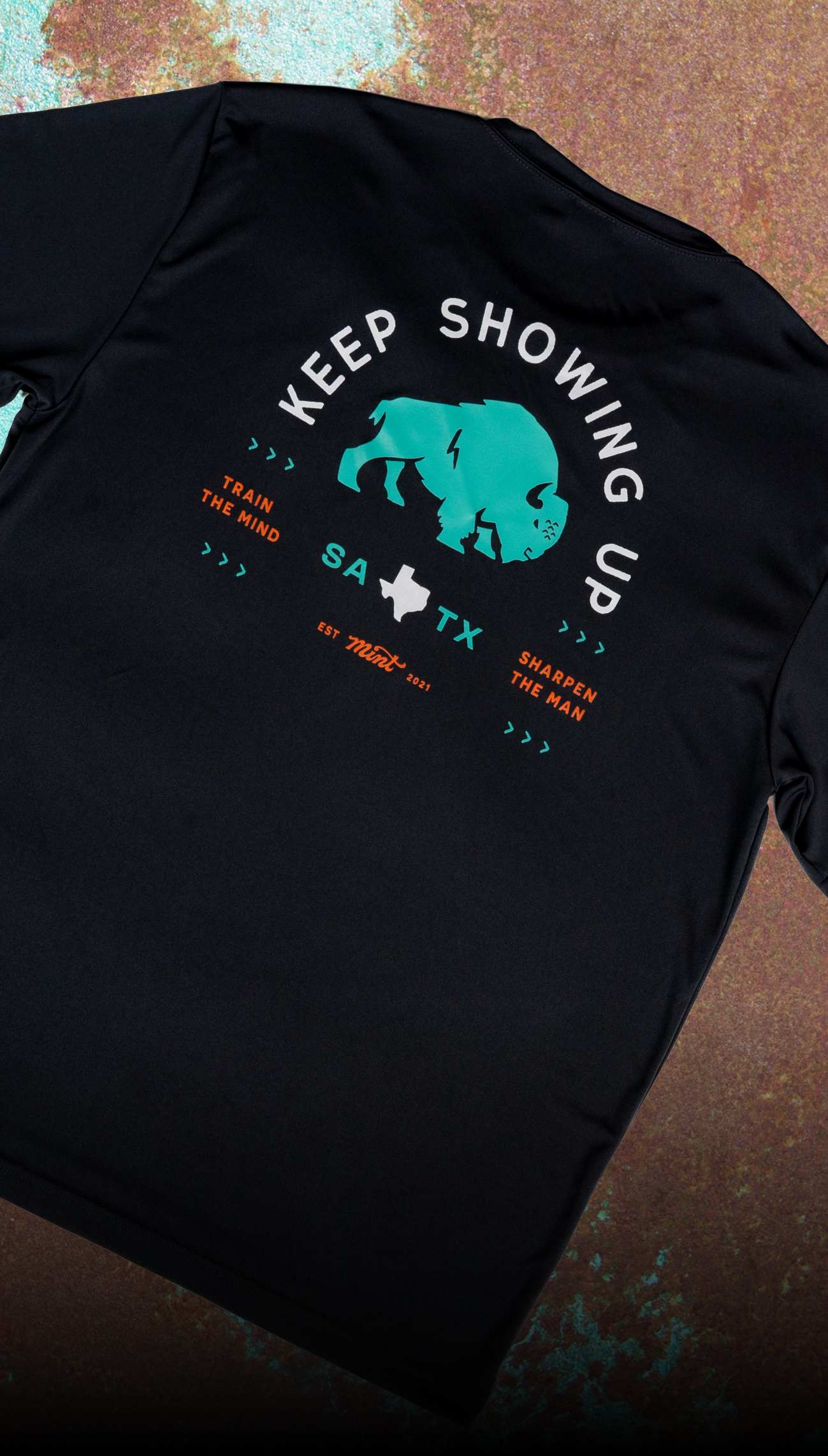 BLUE BUFFALO "KEEP SHOWING UP" T-SHIRT - SPORT TEK